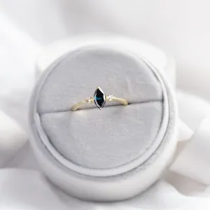 ADINA gold ring with a blue marquise diamond, shown in full view