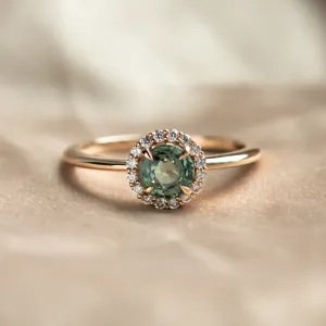 Diamond halo teal sapphire engagement ring SPARKLE