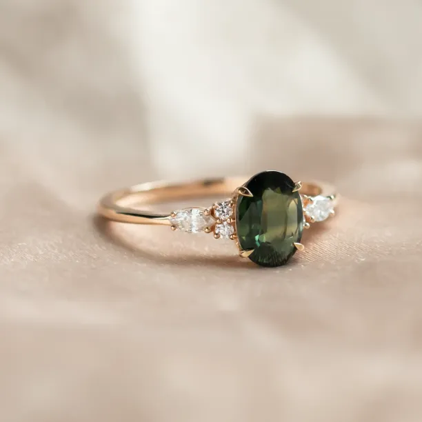 Oval cut sapphire ring with marquise diamonds ETERNELLE