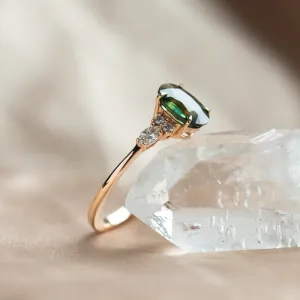Oval cut sapphire ring with marquise diamonds ETERNELLE