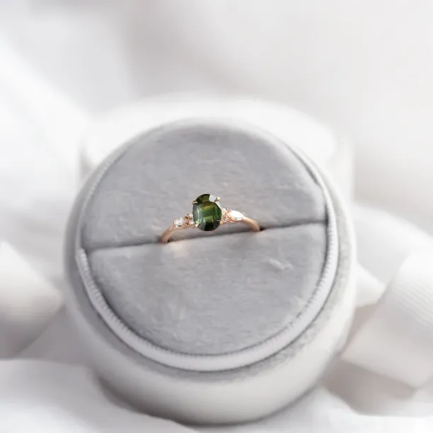 Oval cut sapphire ring with marquise diamonds ETERNELLE