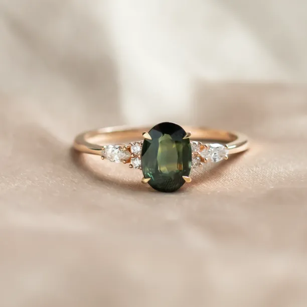 Oval cut sapphire ring with marquise diamonds ETERNELLE