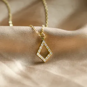 Close-up of the gold necklace with lab-grown diamond kite pendant