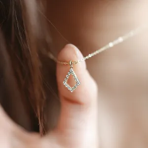 Close-up of the HEATHER gold necklace and lab-grown diamond kite pendant