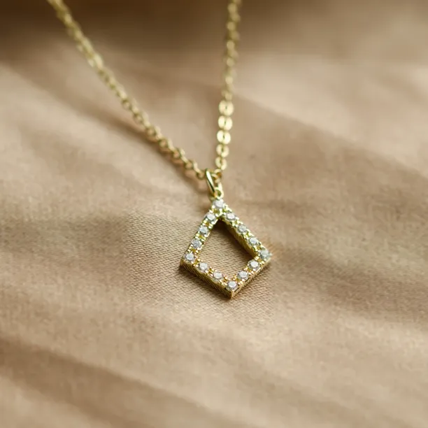 HEATHER gold necklace with lab-grown diamond kite pendant, angled close-up