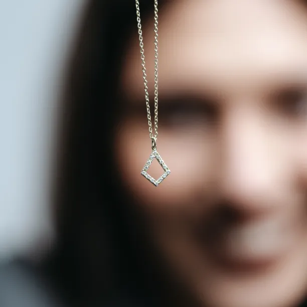 Close-up of the HEATHER necklace chain and lab-grown diamond kite pendant