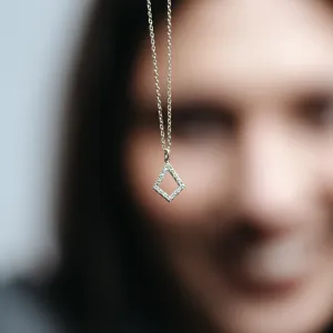 Close-up of the HEATHER necklace chain and lab-grown diamond kite pendant