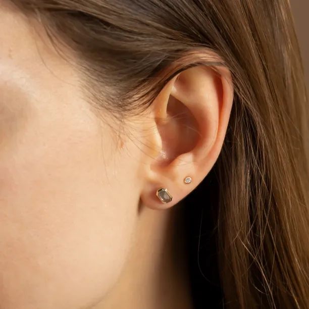 NYLA salt and pepper diamond stud earring worn on the ear
