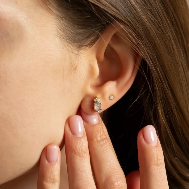 TERRA salt and pepper diamond earring worn on the ear