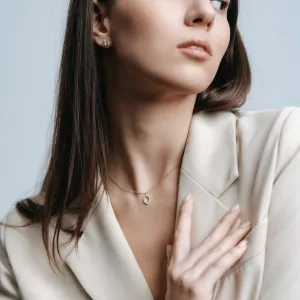 TERRA salt and pepper diamond earring worn on the ear