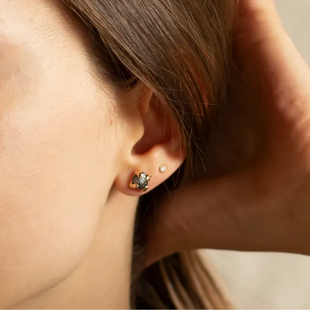CORDELIA raw diamond earring worn on the ear