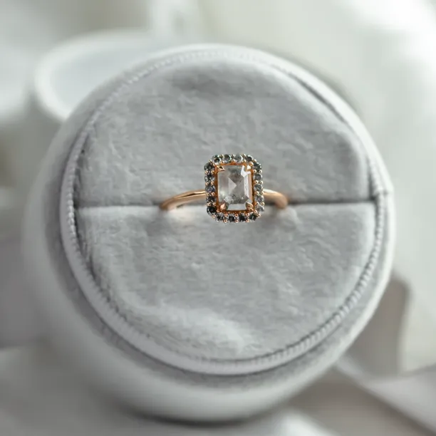 Angled view of the LUCIANA vintage engagement ring with salt and pepper diamonds
