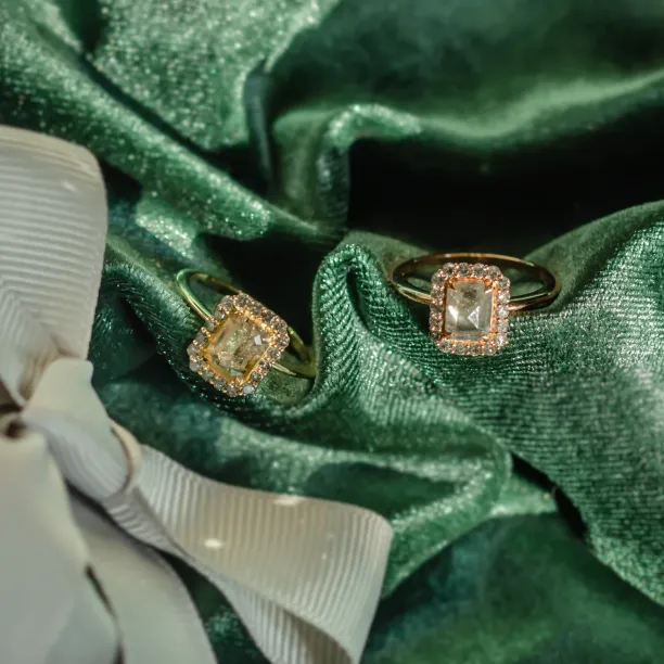 LUCIA gold ring with salt and pepper diamond halo shown in two positions
