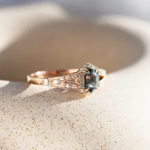 Angled view of the HARRIET engagement ring with sapphire and diamond-set band