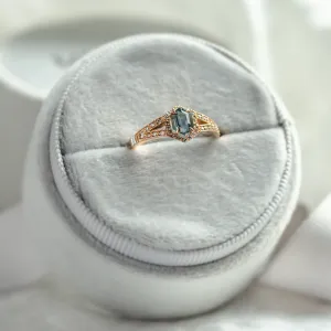HARRIET engagement ring with hexagonal teal sapphire and diamond-set band