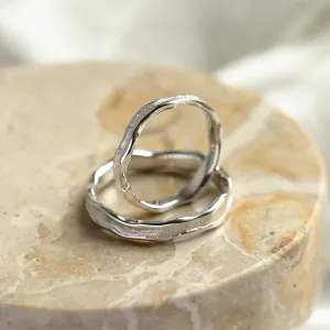 SAVANNAH wedding rings, one upright to reveal the inner surface