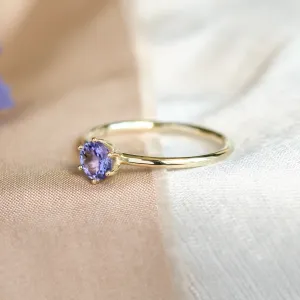 Side view of the TANJA ring showing its tanzanite setting