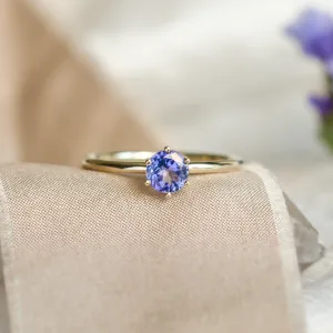 Close-up of TANJA minimalist engagement ring with tanzanite