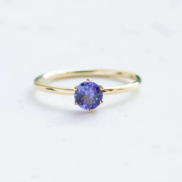 TANJA minimalist engagement ring with a blue-purple tanzanite