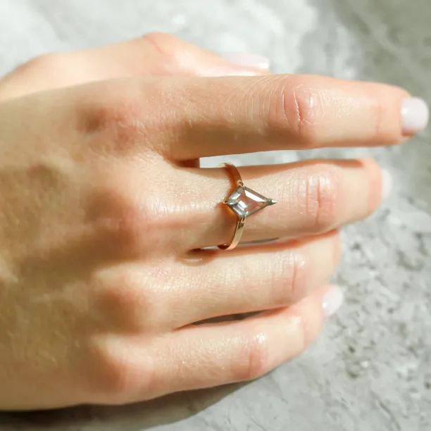 CASEY engagement ring with a kite-shaped diamond worn on the hand