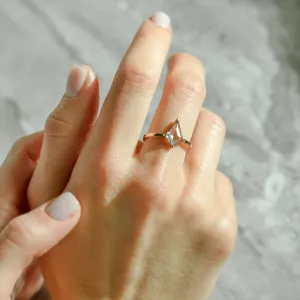 CASEY engagement ring with a kite-shaped diamond worn on a finger