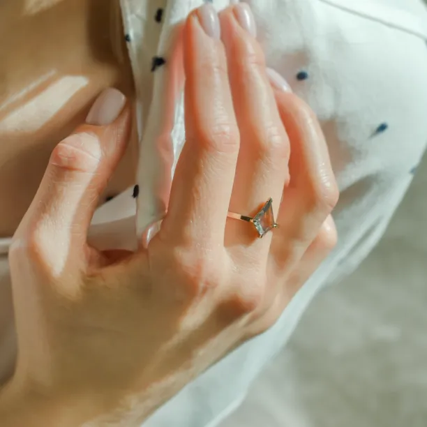 CASEY kite-shaped diamond engagement ring worn on the hand