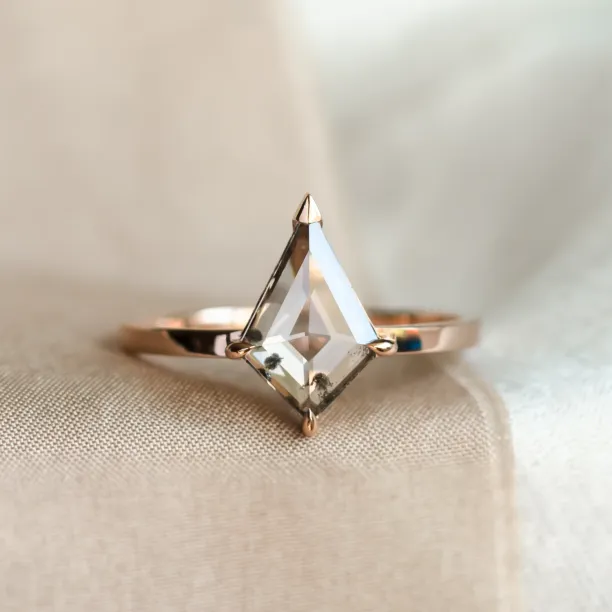 CASEY gold engagement ring with a lab-grown salt and pepper diamond in a kite shape