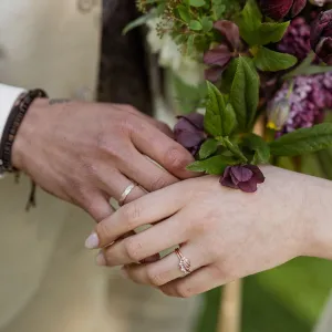 EDDY engagement ring with pink lab grown diamond worn on a hand