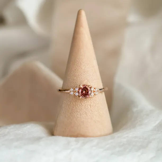 EDDY engagement ring with a pink lab grown diamond and natural diamonds