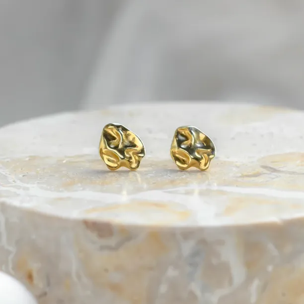 Pair of gold heart-shaped CHÉRIE earrings with irregular sculpted surfaces