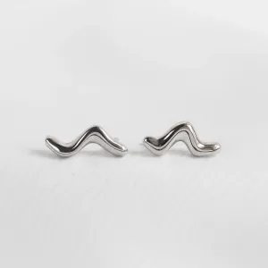 Pair of MIGNON wave earrings in a clear product view