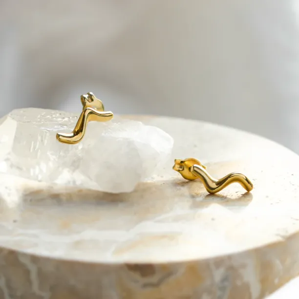 MIGNON wave earrings shown from an angled view