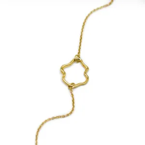 Close-up of the irregular centerpiece on the MICHELE gold bracelet