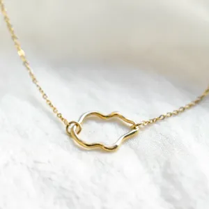 Close-up of the irregular centerpiece on the MICHELE gold bracelet