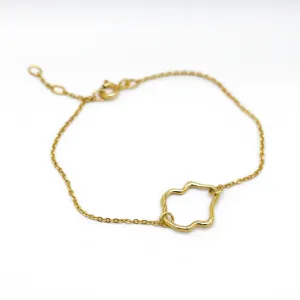 Gold MICHELE bracelet with an irregular design element