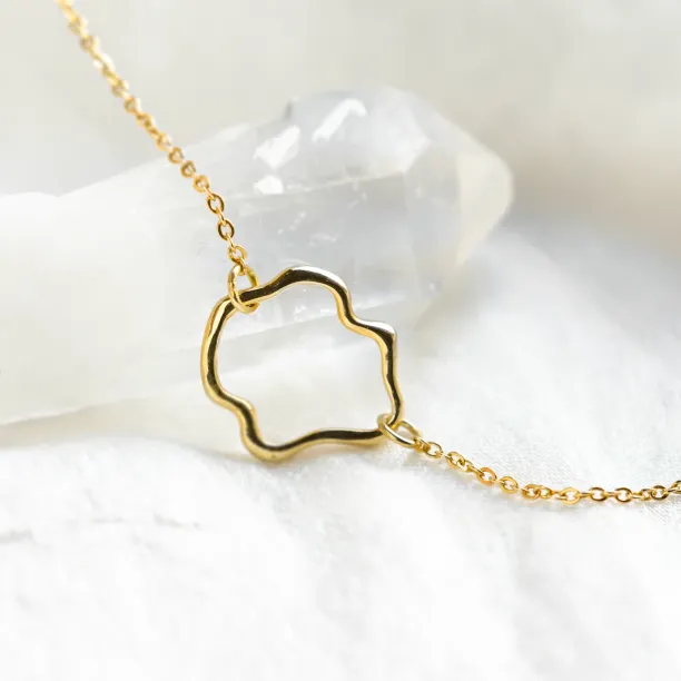 MICHELE gold bracelet with an irregular central element, close-up
