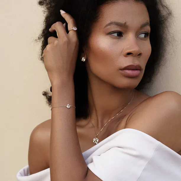 Gold LAURENCE bracelet worn on the wrist