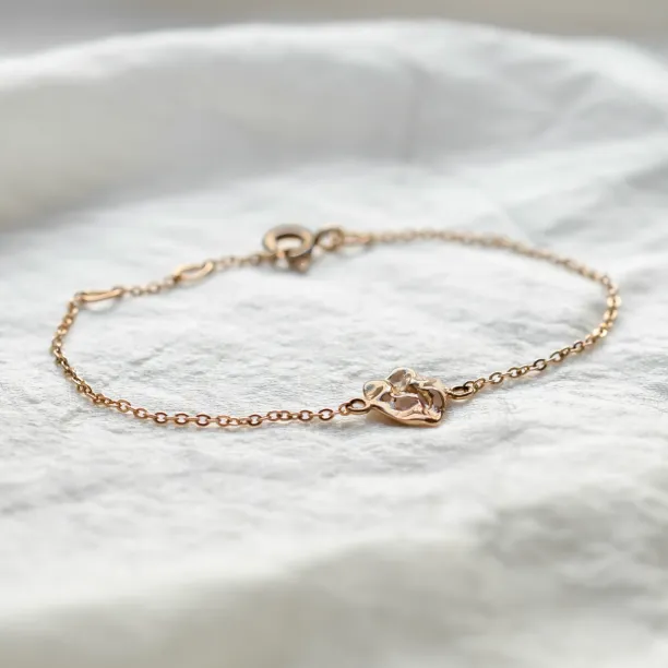 Gold LAURENCE bracelet shown in full with its central design element