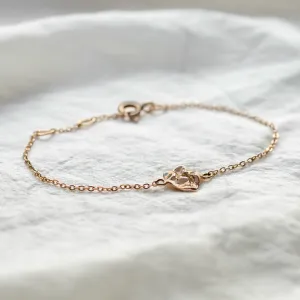 Gold LAURENCE bracelet shown in full with its central design element