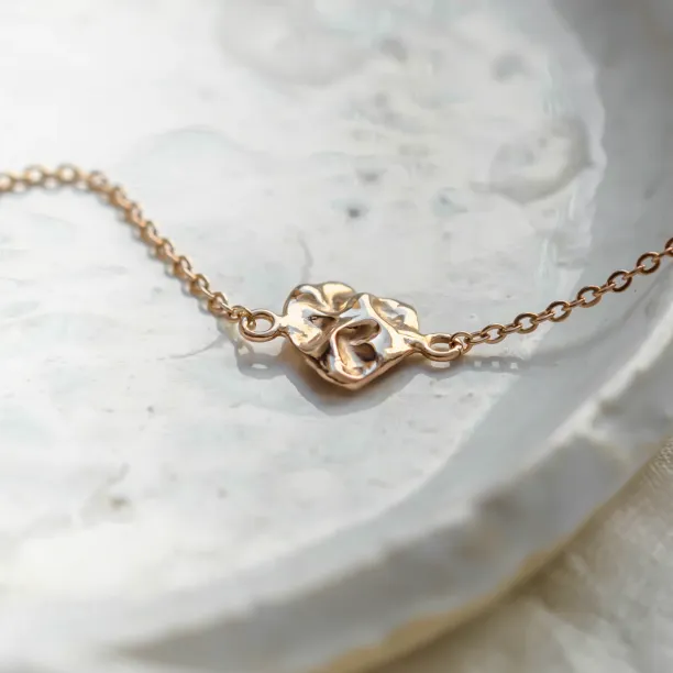 Gold bracelet LAURENCE with an irregular heart-like design element