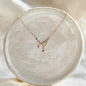Full view of the MADELEINE dripping liquid necklace with diamond