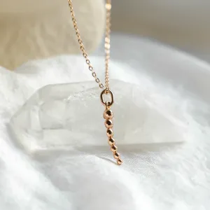 CLAUDE diamond necklace pendant with graduated bead details