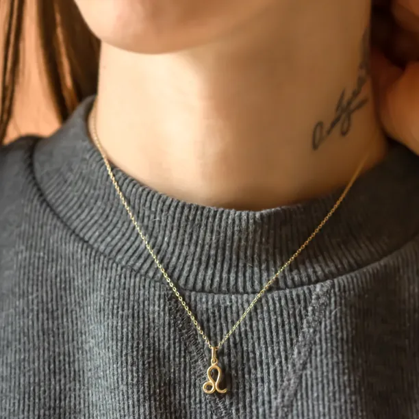 Leo zodiac necklace with diamond pendant worn on the neck