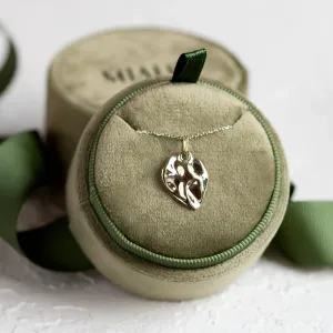 Close-up of the MARGUERITE heart-shaped necklace pendant