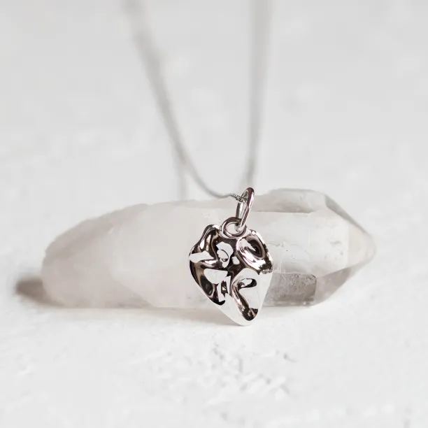 MARGUERITE heart-shaped necklace pendant in a close-up view