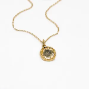 COLETTE personalised diamond necklace with an engraved M pendant