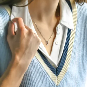 Letter V pendant with diamond worn on the neck