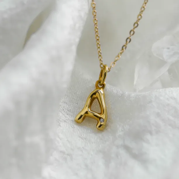 JEAN yellow gold letter A pendant with diamond on a chain