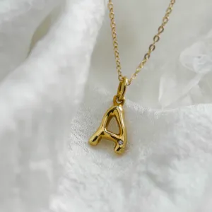 JEAN yellow gold letter A pendant with diamond on a chain
