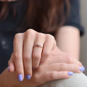 Black diamond wedding ring from the DUE pair worn on a hand